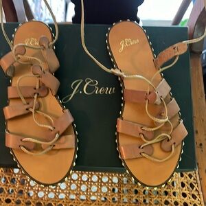 Size 7 Jcrew lace up tan with grommets around the base of the shoe